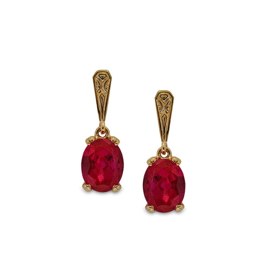 Photo of ruby replica earrings with gold design